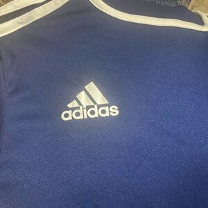 2 Adidas soccer shirts in great used condition. Size small.